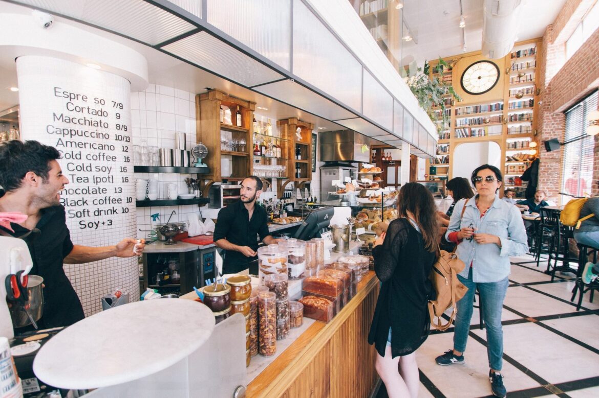 Busy cafe counter with customers